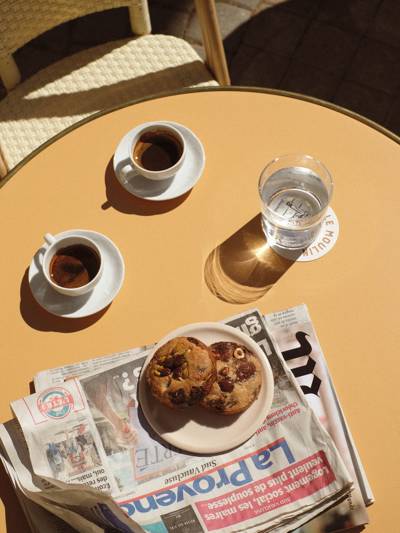 Coffee and cookie break on the terrace of Le Moulin in Lourmarin after a morning at the Provence market