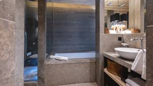 A photo shows a bathroom with all essentials carefully organized and neatly arranged.