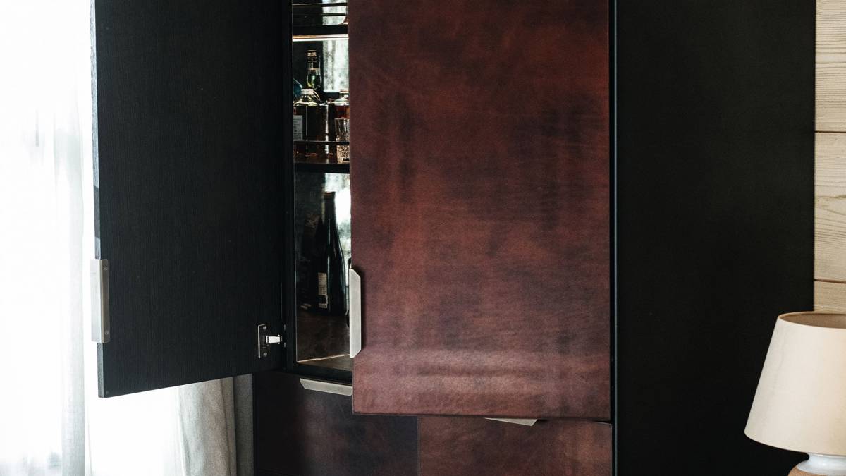A clicked photo shows beautifully finished shelves in light brown color with open shelf doors.