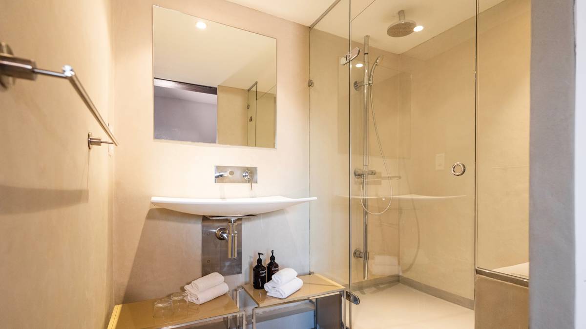 A photo capturing a neat bathroom with properly arranged items and an organized appearance.