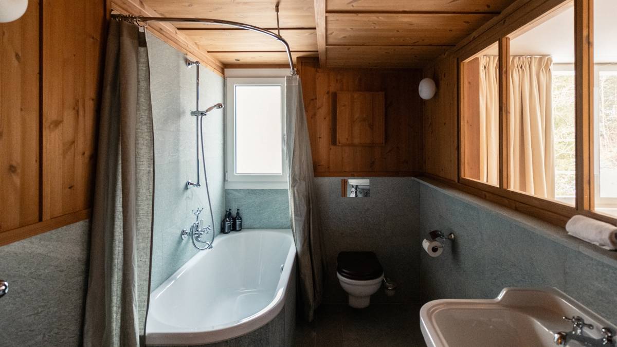 A photo captures a modern bathroom, with all essentials neatly organized and properly arranged throughout.