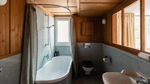 A photo captures a modern bathroom, with all essentials neatly organized and properly arranged throughout.