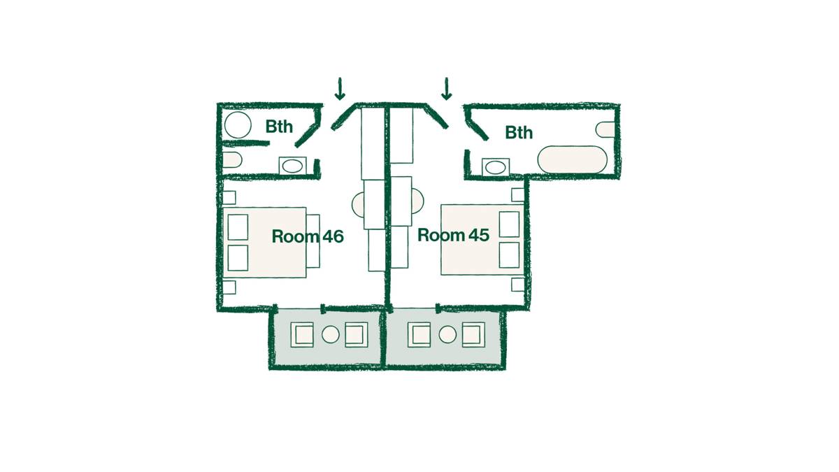 A floorplan of a house is presented in green color against a white surface.