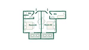 A floorplan of a house is presented in green color against a white surface.