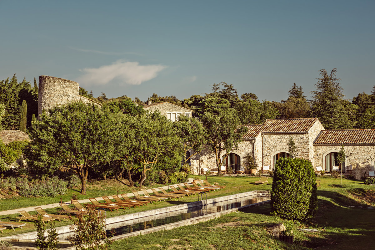 Pool and Provençal gardens of the Beaumier hotel Capelongue in Bonnieux, Luberon
